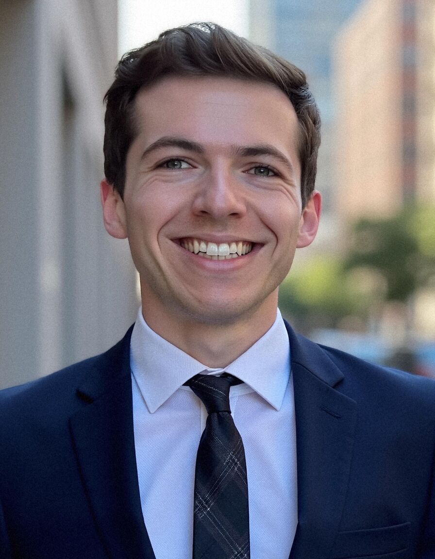 AI headshot of Ben: city street, navy suit and tie